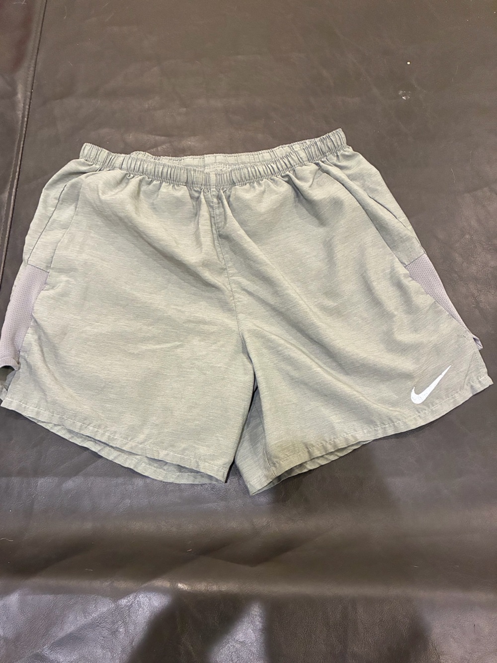 Light Grey Nike running shorts. Men’s small unlined